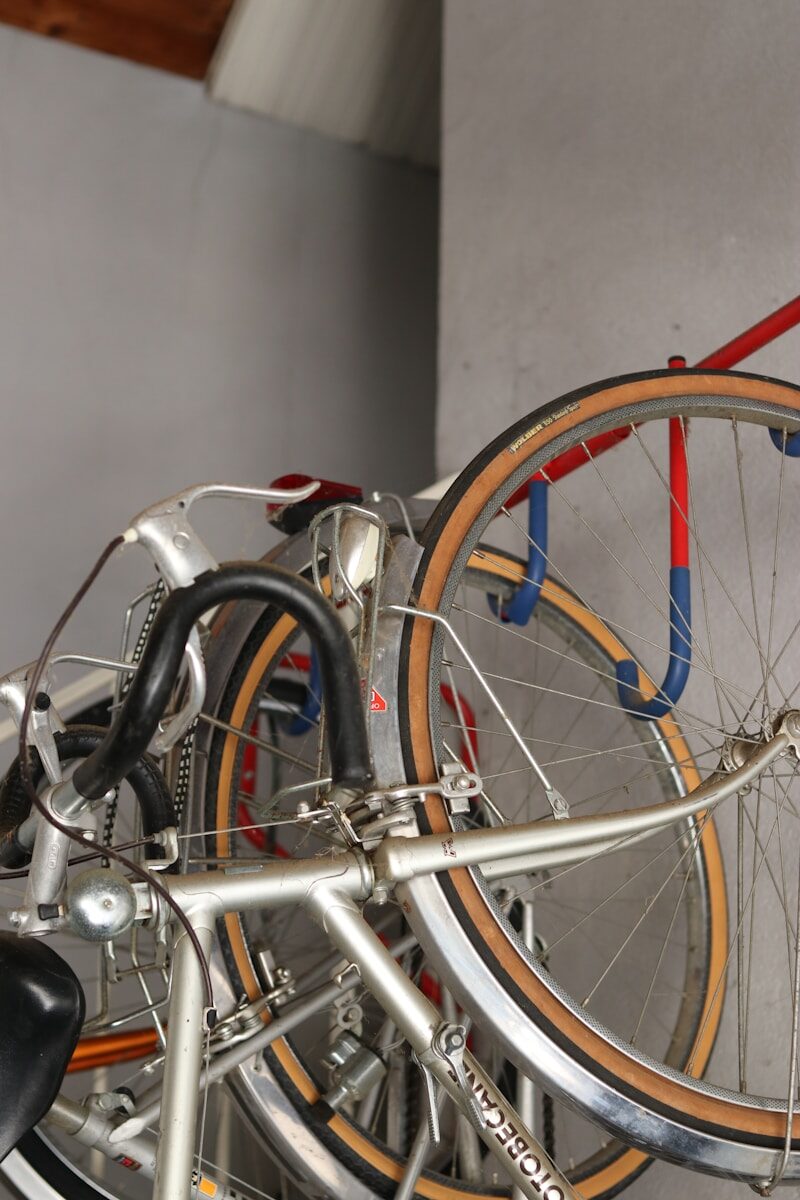 Bicycles are stored on a wall-mounted rack.