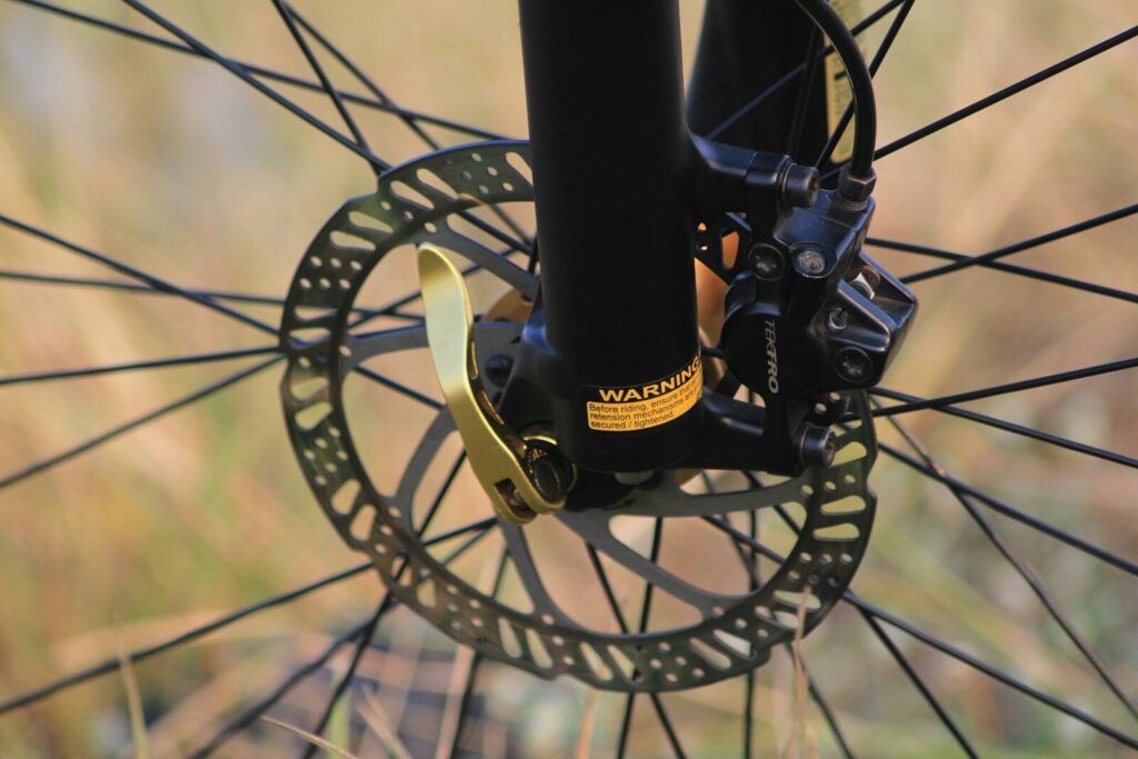 A close up of the spokes of a bicycle