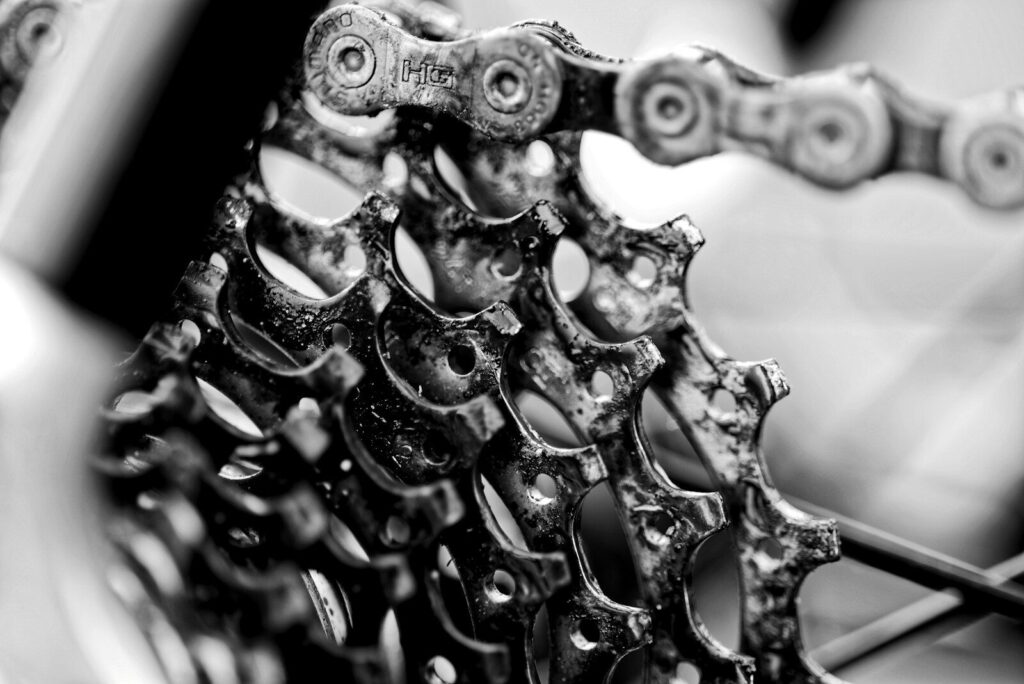 grayscale photo of bicycle derailleur